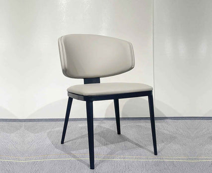 Elegant Contemporary Padded Backrest Leather Dining Chair Modern Silla Comedor With Tapered Steel Legs
