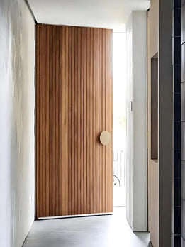 Modern Light Wood Fluted Pivot Door with Elegant Minimalist Round Handle